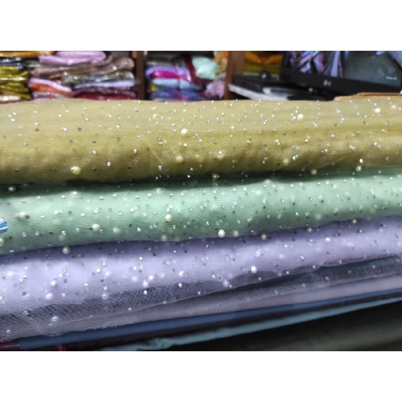 Kain tile mote/mutiara harga per satu meter