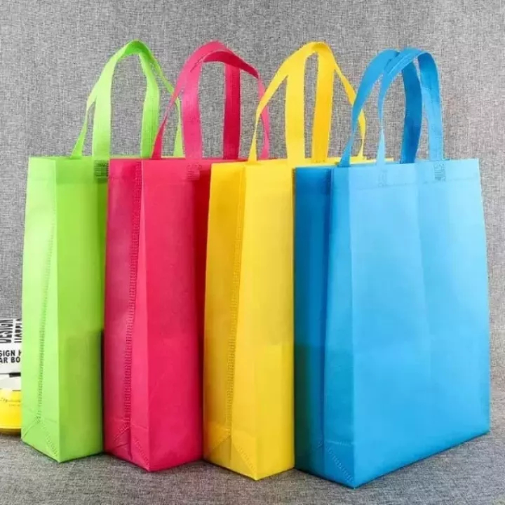 

Goodie Bag Tas Belanja Spunbond Model Tali Handle Ukuran 38x45 Kantong Kain Souvenir Bonbon