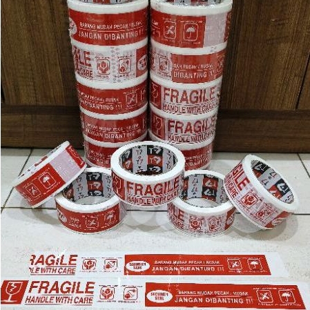 

LAKBAN FRAGILE/ FRAGILE TAPE/LAKBAN PACKING OLSHOP/ LAKBAN JANGAN DI BANTING (Merk T7) ukuran 45MM X 100YARD