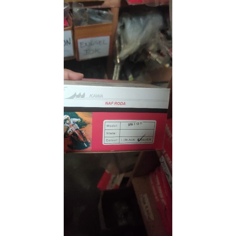 kedudukan gigi tarik belakang Supra x 125 merk Kawa / naf roda