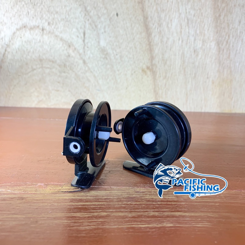 Reel tokos pancing kerekan hitam murah