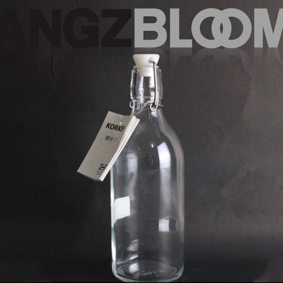 botol kaca bening penyimpan air minum kedap udara