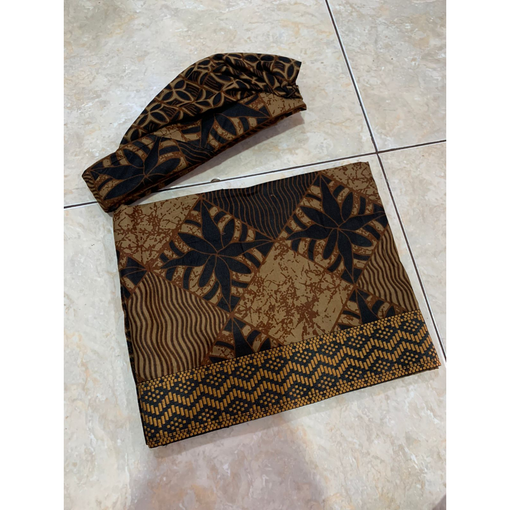 saput dan udeng setengah jadi batik