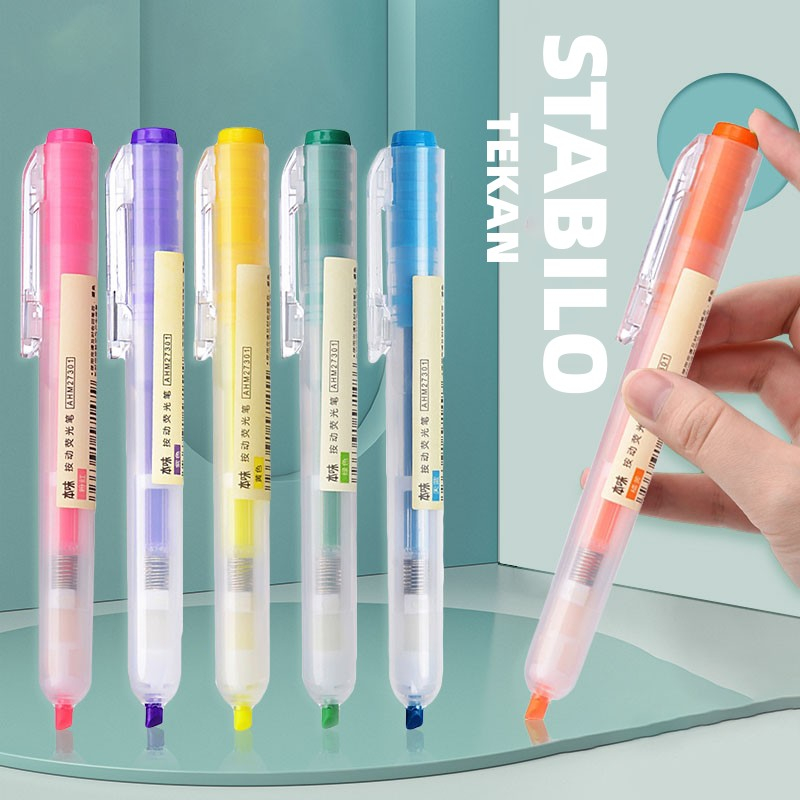 

Siswa penyorot menggunakan pena penanda titik kunci untuk menekan spidol warna permen warna warna sederhana