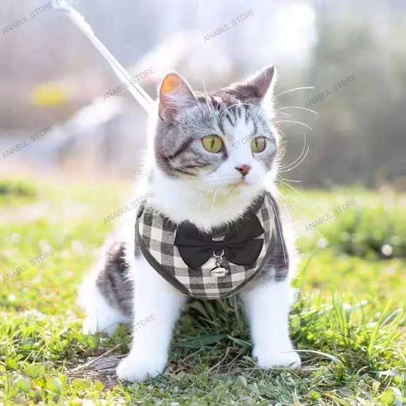 Baju rompi kucing harnes dengan tali hewan peliharaan bahan lembut model dengan pita dan lonceng