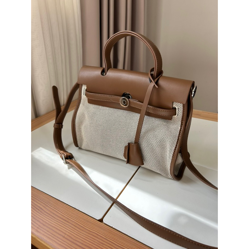 MOCELI - SNY the label / tas sling selempang wanita (preloved) kondisi excellent