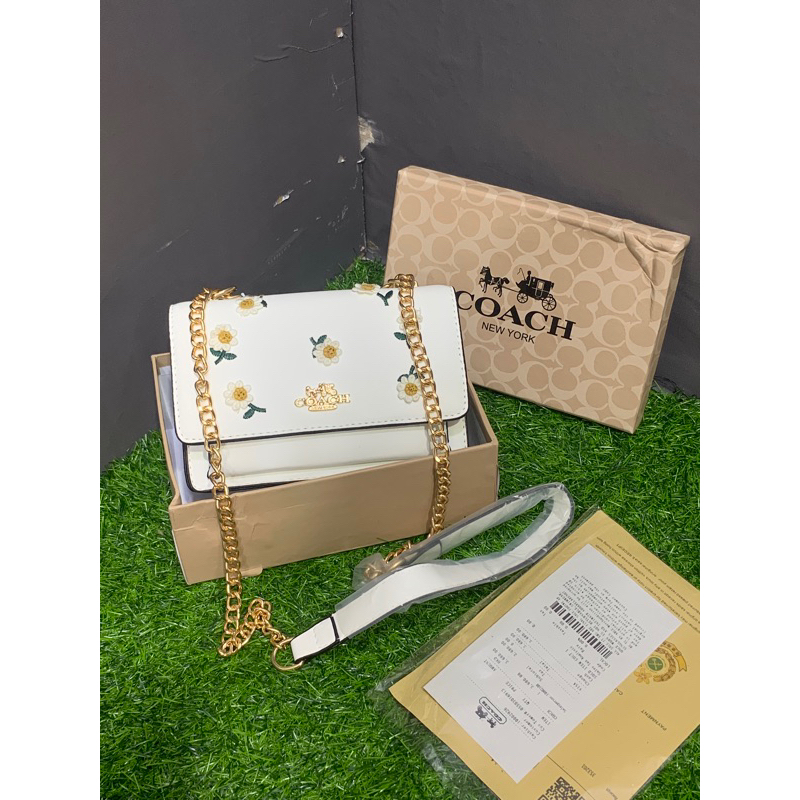 Tas import coach daisy