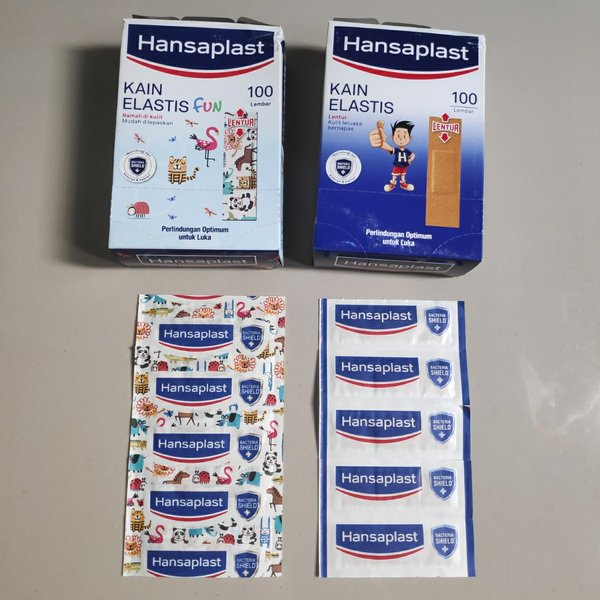{ PerBox isi 100 } Hansaplast Kain Elastis Plester Lentur Merekat Kuat isi 100pcs (Hansaplast Polos 