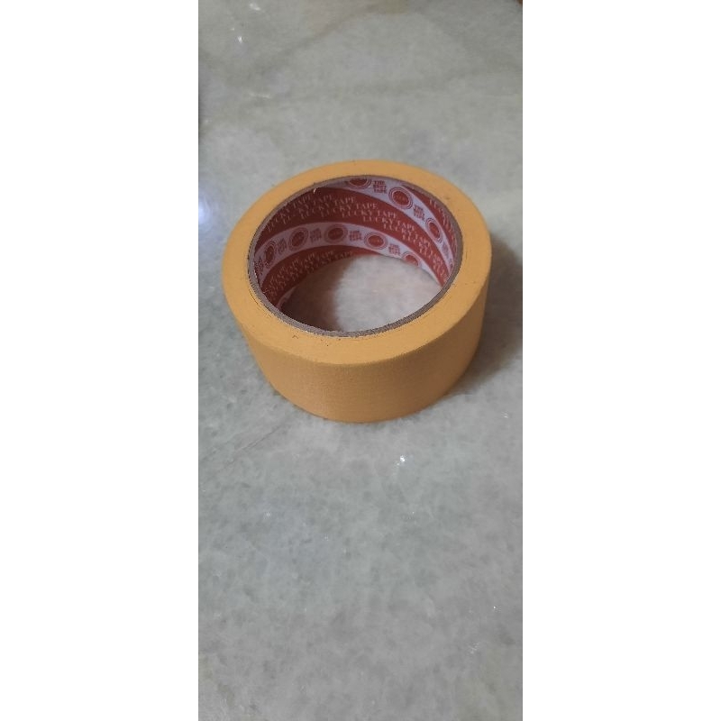 

Lakban kertas/Masking tape