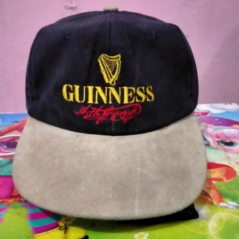 Topi Guinness minuman VTG
