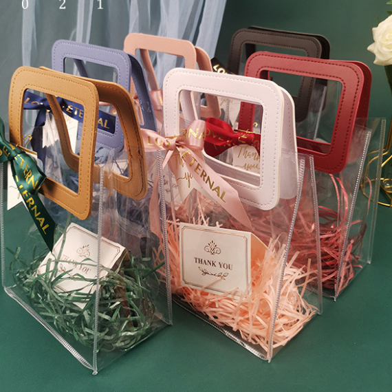 

Tas PVC transparan - tas hampers - handbag gift hampers - pegangan tangan kulit - tas hampers lebaran imlek natal birthday