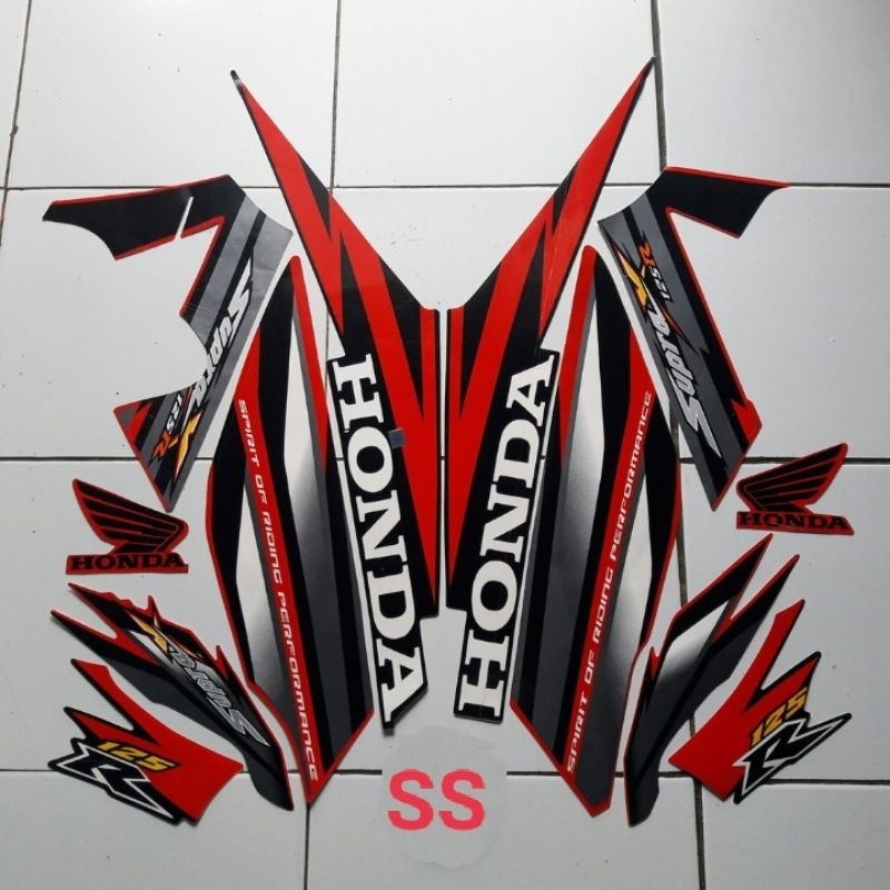 STIKER STRIPING LIS BODY MOTOR SUPRA X 125 R TAHUN 2006 HITAM MERAH