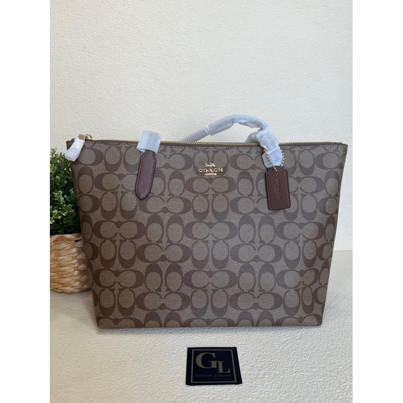 Coach signature zip tote