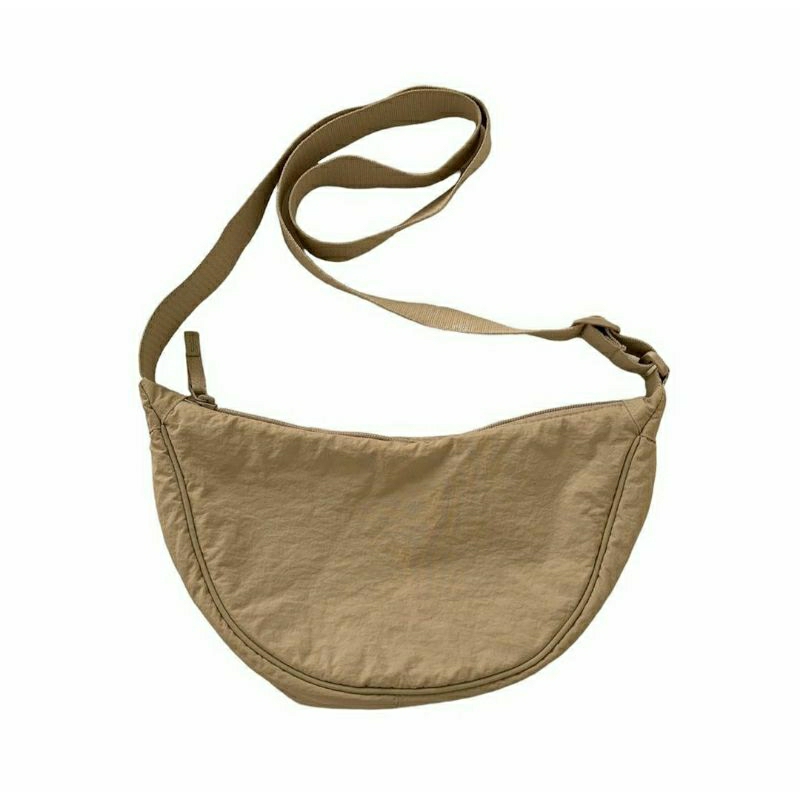 Tas sling bag uniqlo cream sand message bag