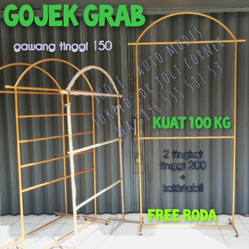 GAWANG BAJU EMAS OVAL 2 TINGKAT KERUDUNG ATASAN ROK BAWAHAN SUSUN BERTINGKAT SISI ARAH MUKA JUALAN L