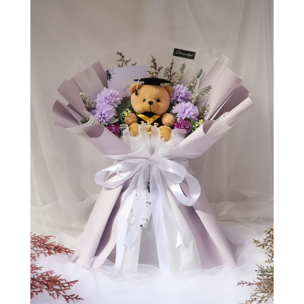 BUKET BONEKA WISUDA / BUKET WISUDA / BUCKET BUNGA PALSU / BUKET UANG / BUKET SNACK (UNGU-PUTIH)