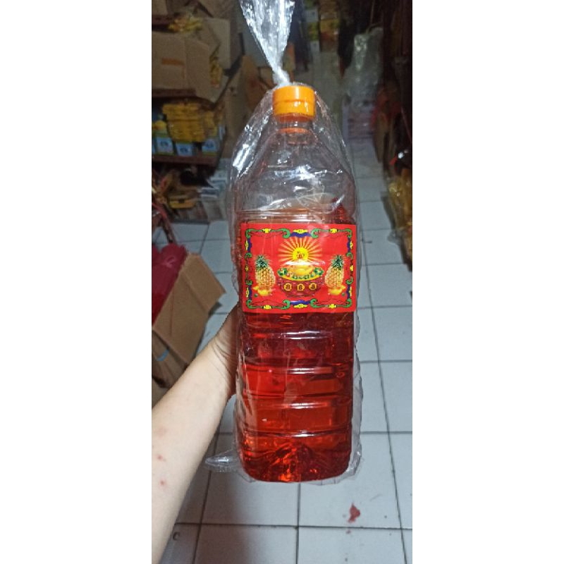 minyak sembahyang warna merah