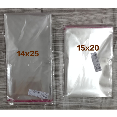 

Kantong Plastik OPP 14x25 / 15x20 / 12x25 tebal 03 isi 100 lbr / plastik undangan lem seal perekat