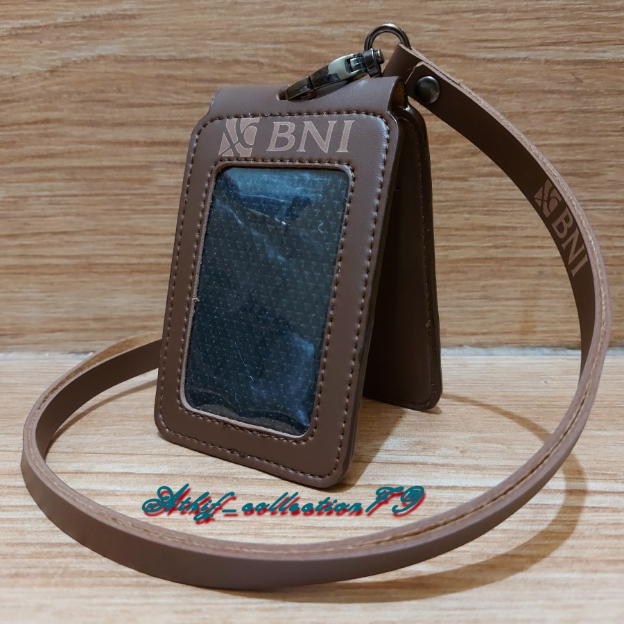 

Holder Id Card Bank BNI / Kalung Id Card Bank BNI Model Lipat Cokelat