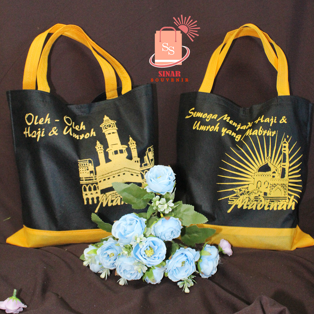 

TAS SOUVENIR OLEH OLEH HAJI DAN UMROH HITAM KUNING - GOODIE BAG UMROH LANGSUNG KIRIM