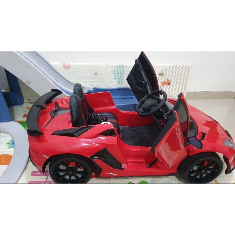 Mobil aki anak Pliko PK 8528LN Lamborghini merah -preloved