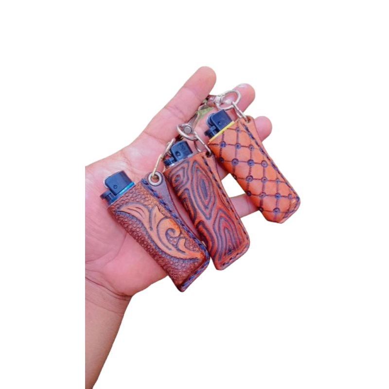 SARUNG KOREK CRICKET KULIT UKIR