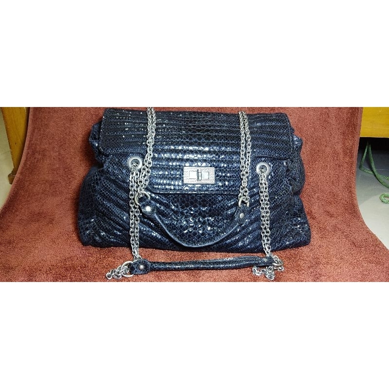 Tote kulit ular asli