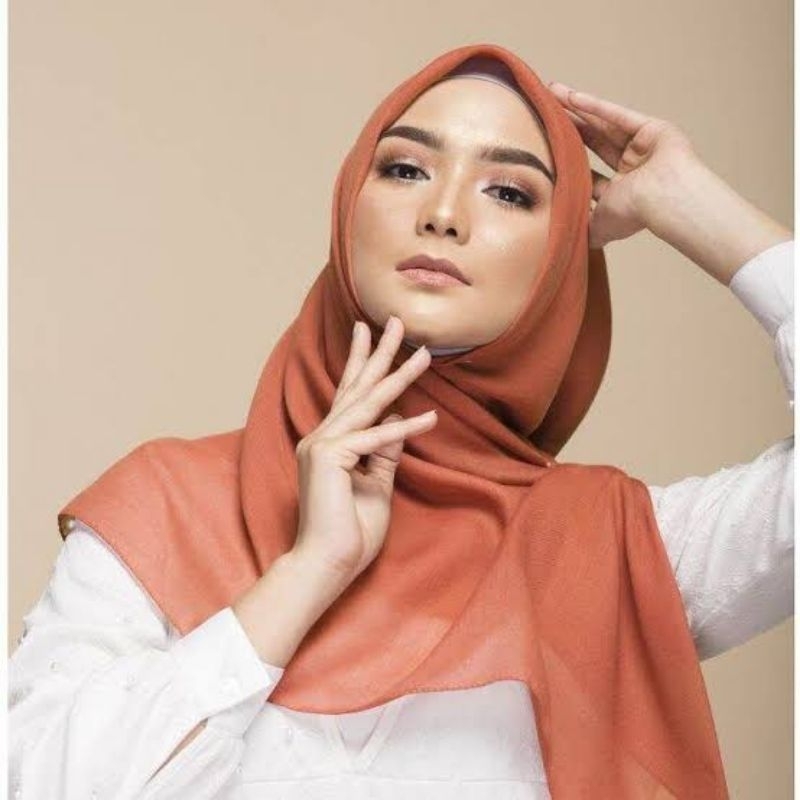 jilbab elzatta merah bata