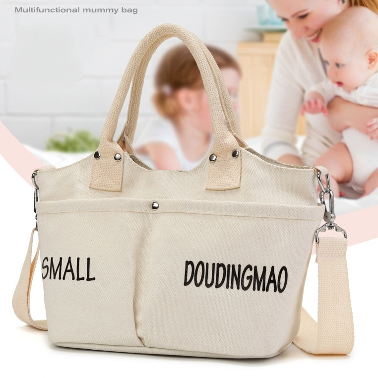 TAS SELEMPANG WANITA MUTLTIFUNGSI PERLENGKAPAN BAYI MUMMY BAG KANVAS KREM SWAINSON TA826W1 POPOK DIAPER BOTOL SUSU TRAVELING IMPORT MURAH SHOULDER BAHU