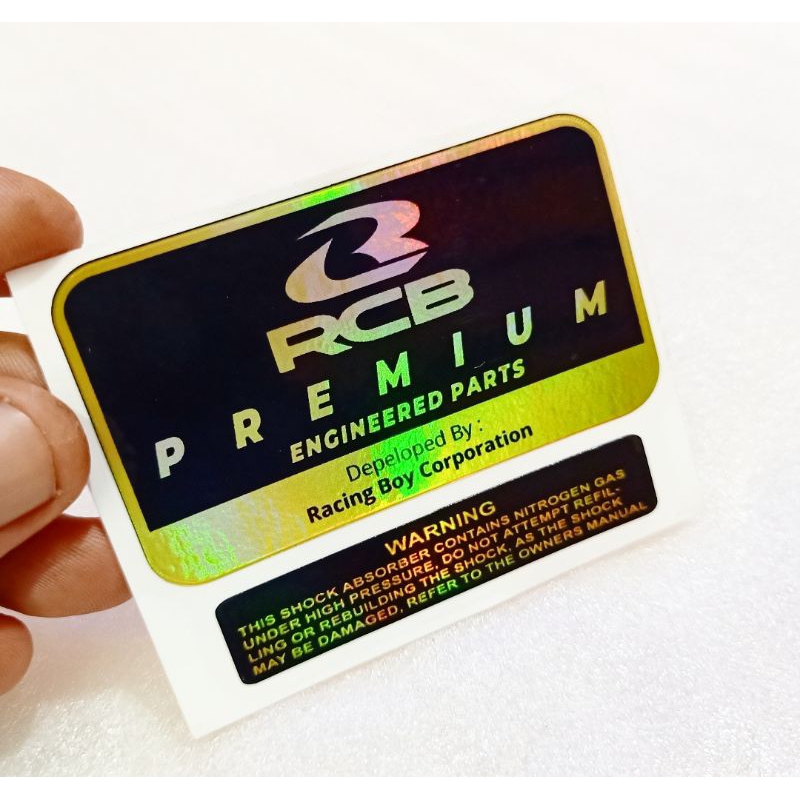 STIKER SHOCK TABUNG BELAKANG RCB PREMIUM GOLD