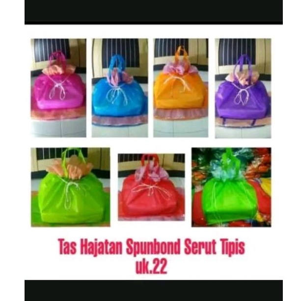 

Tas hajatan spunbond serut tipis 1 lusin isi 12 polos motif atas ukuran 22x22