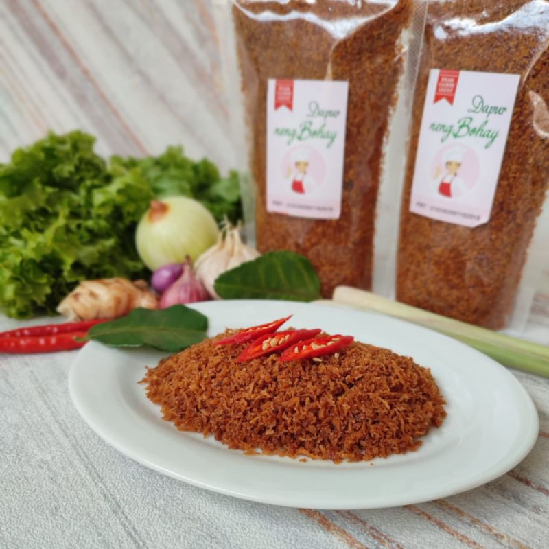 

Isi 100gr Srundeng kelapa original gurih manis pedas nengbohay