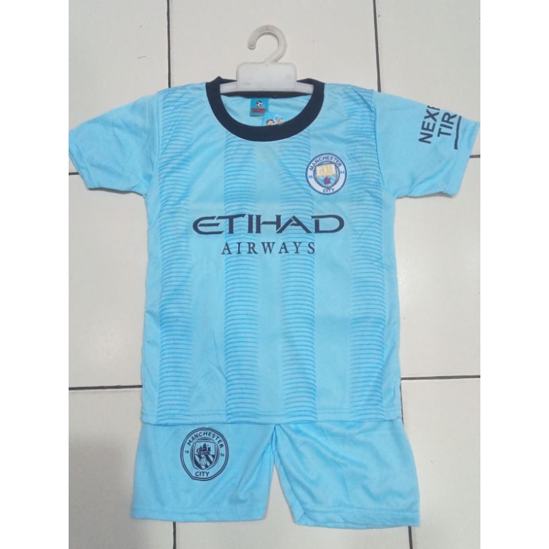 Baju bola Manchester City anak umur 10 tahun - 11 tahun