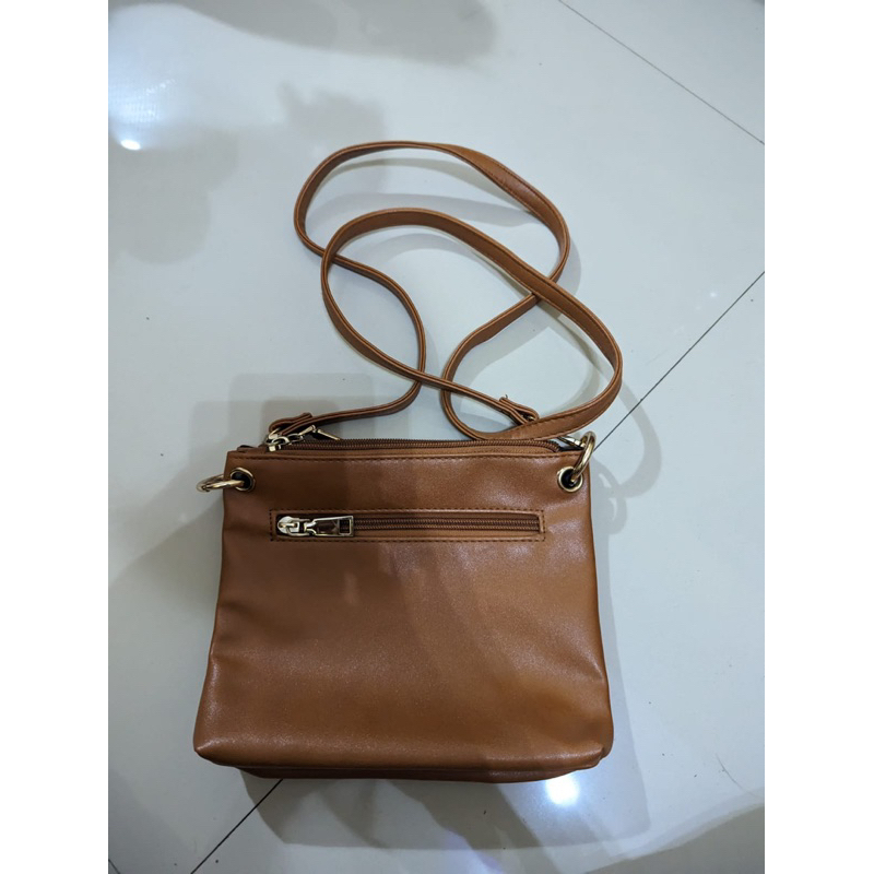 tas selempang usupso