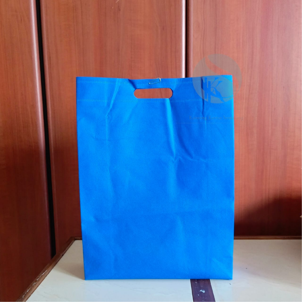 

Tas Spunbond SOS goodie bag oval 30x10x40 murah press/spunbun/tas kain