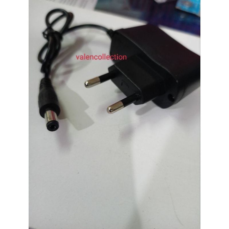 Adaptor charger senter kepala adaptor charger senter tangan