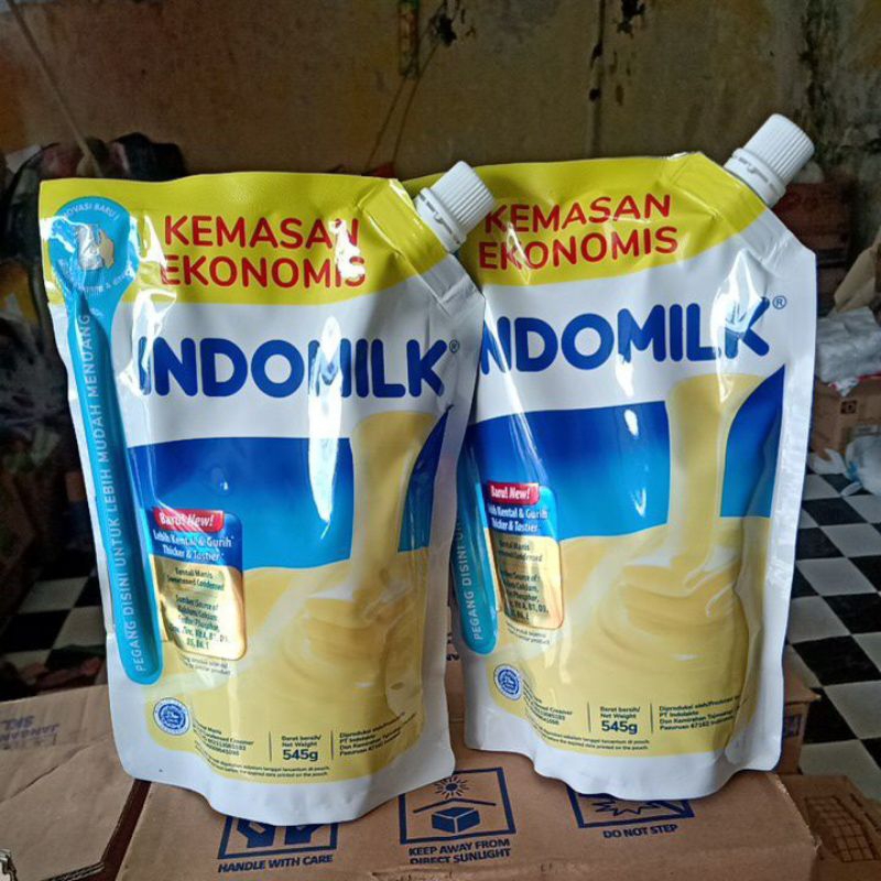 

SKM Frisian flag 545ml/indomilk 545ml putih/coklat