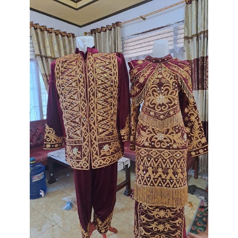 baju penganten minang spasang.