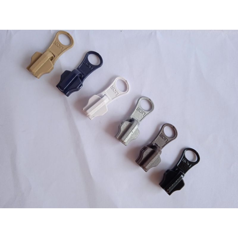 kepala resleting jaket lion bolak balik no 5