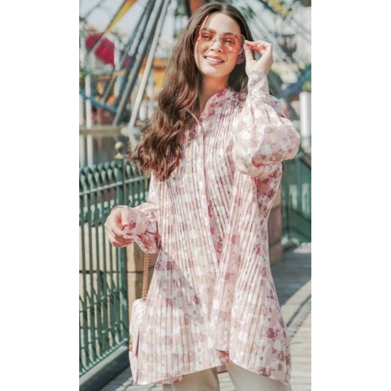 Benang jarum puzzlea pleated shirt