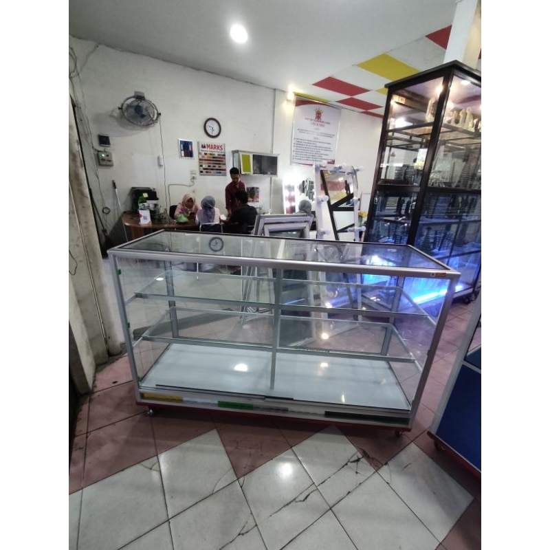 Steling Rak kaca Jualan jas hujan, atk dll p150 l50 t100