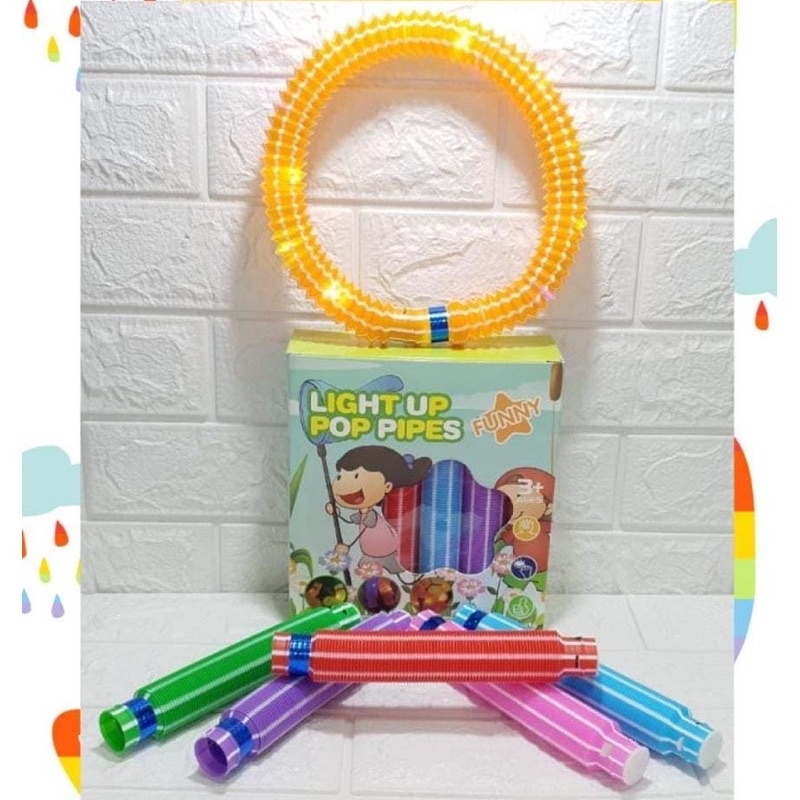 Mainan anak terbaru Light Up pop Pipes belang / mainan lampu LED pipa selang