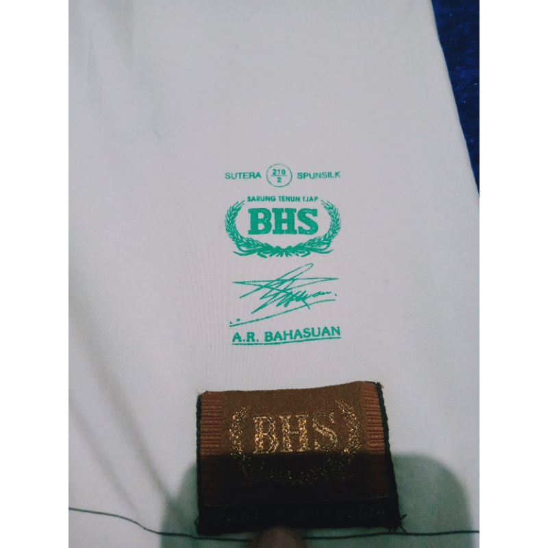 sarung bhs tkb logo gold sutra spunsilk second