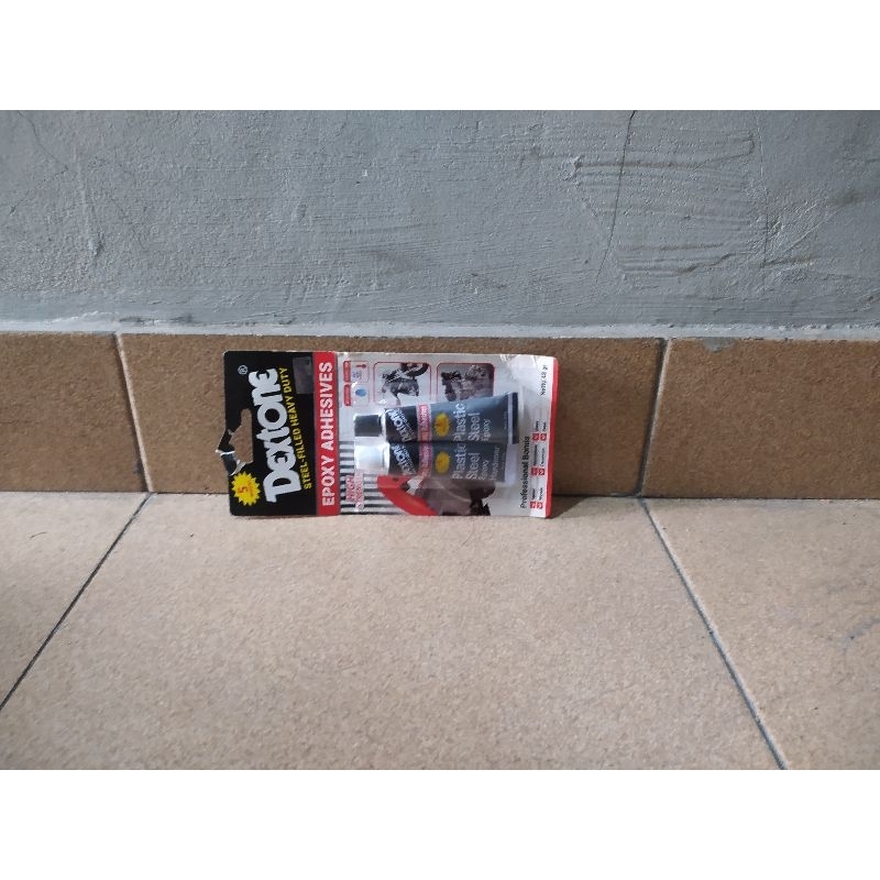 

lem besi dextone hitam putih