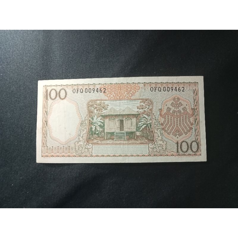 100 rupiah seri pekerja merah UNC