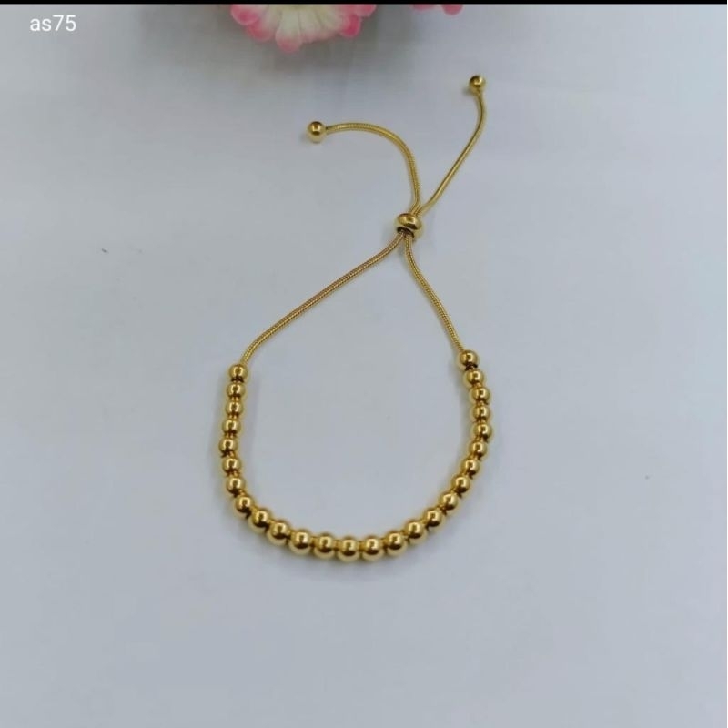 Gelang Tangan Serut Titanium Wanita Motif Biji Lada Gold