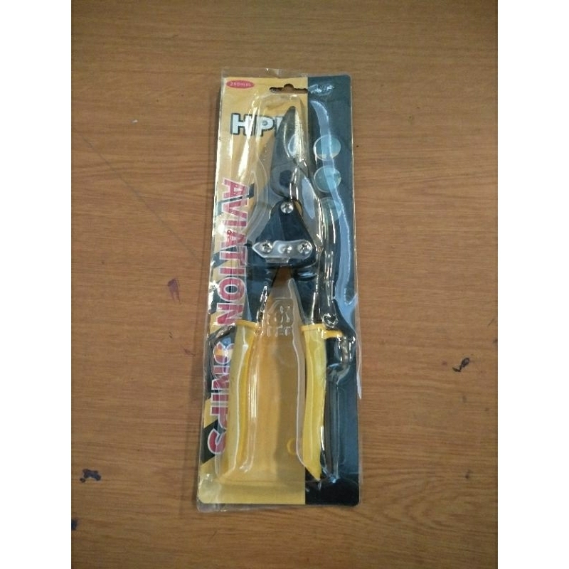 

Gunting baja ringan holo