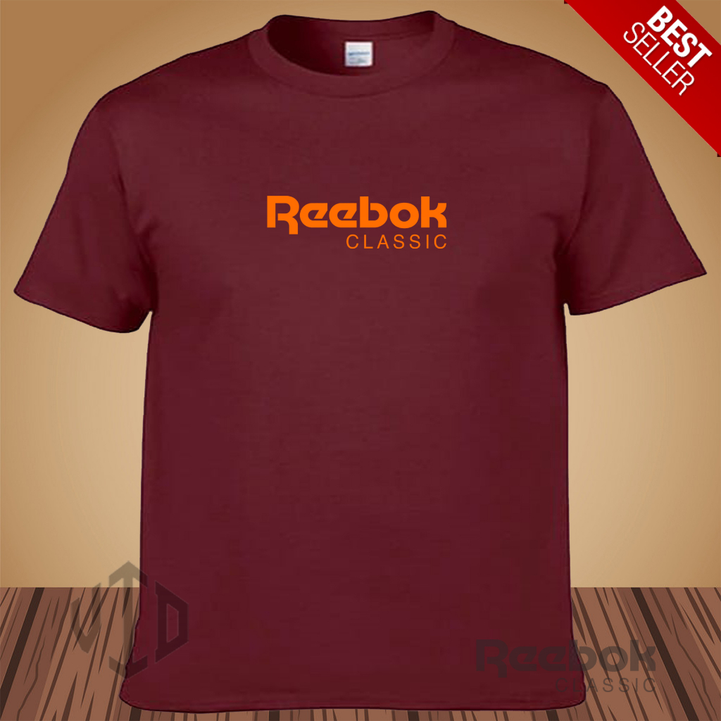 Kaos Keren Lengan Pendek LOGO RIEBOOK CLASSIC MOTIF ORANGE Distro Premium / Kaos Murah / Kaos Ukuran