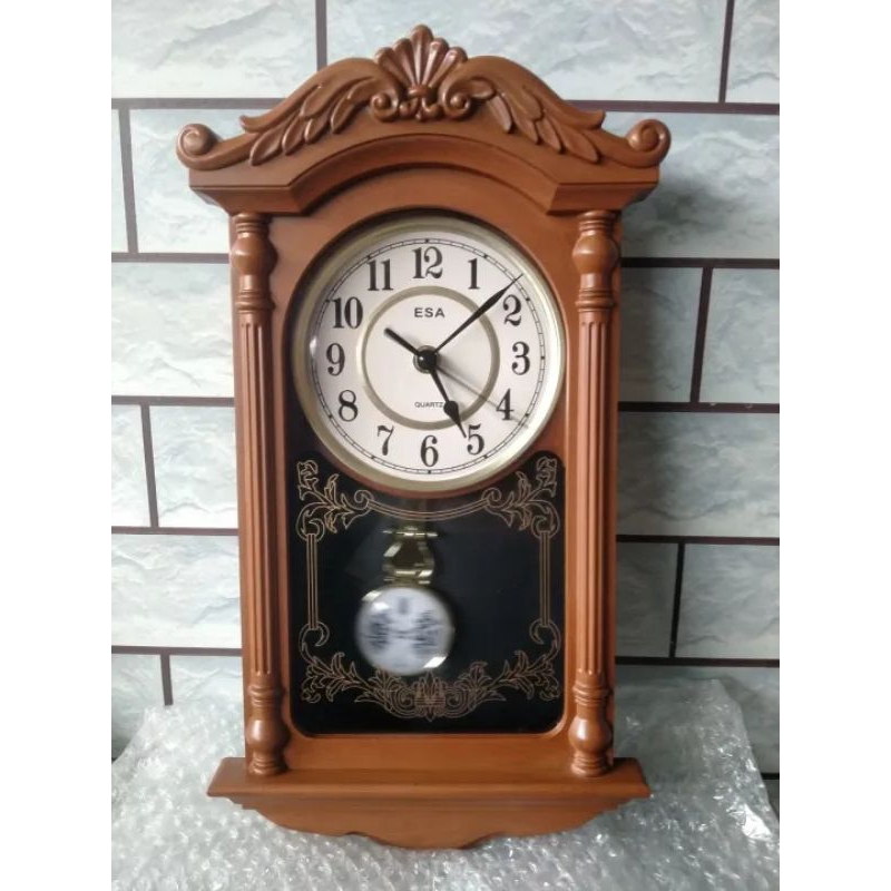 jam dinding musik bandul esa 6200