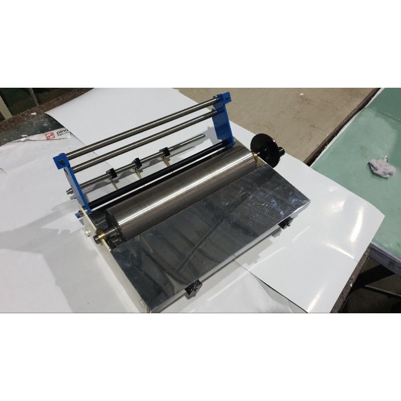 

Mesin Lem Kertas Hardcover Manual ukuran 30 cm bisa Diatur Tebal Tipis